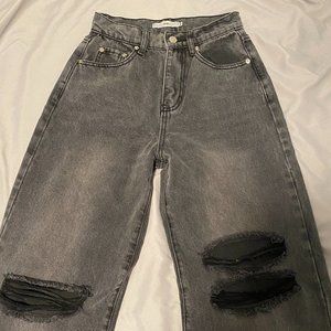 adika wide leg, high waisted, faded grey wash jeans with knee rips